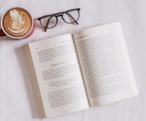 Book with coffee and glasses on table book-20@2x